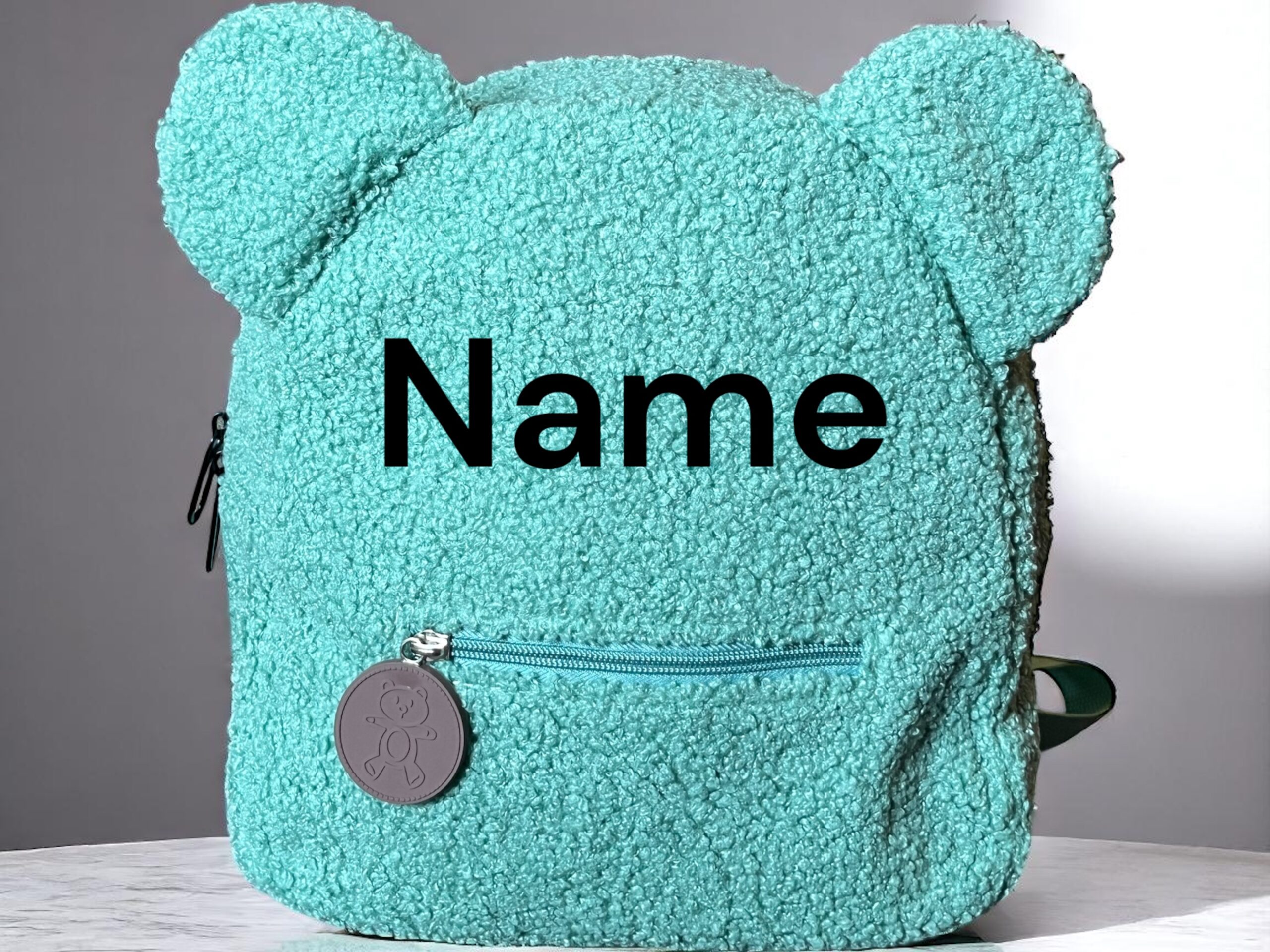 Kinderrucksack in mint mit Namen bestickt